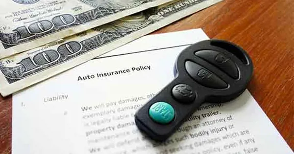 insurance policy with keys and money