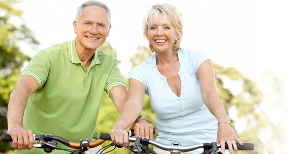 old couple riding bikes