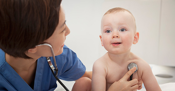 doctor examining baby