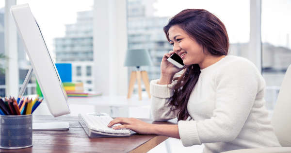 woman talking to insurance agent on phone