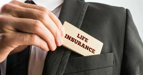 man holding insurance agent card