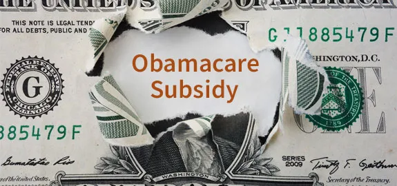 dollar bill that says obamacare subsidy