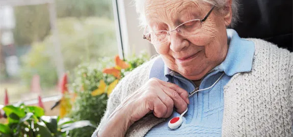 senior woman with medical alert necklace