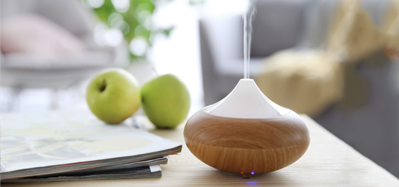 aromatherapy oil diffuser on table