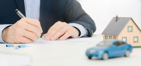 Signing home and auto insurance documents