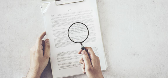 Contract with magnifying glass 
