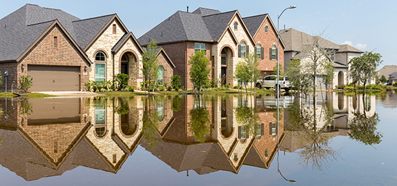 Row of homes in flooded streets