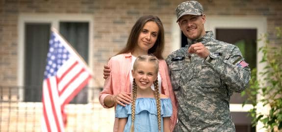 veteran and family and house