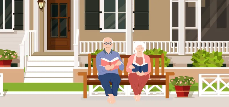 senior couple in front of home