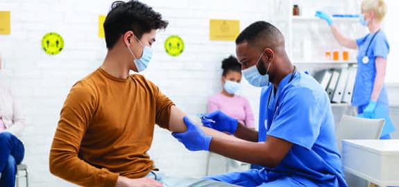 Adult Vaccination Rates and the Adoption of a COVID-19 Vaccine